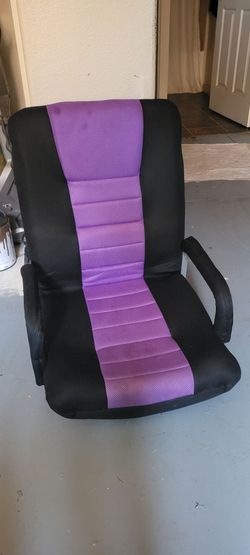 Best Choice Products 360-Degree Swivel Gaming Floor Chair in black and purple, featuring a foldable backrest and padded armrest handles