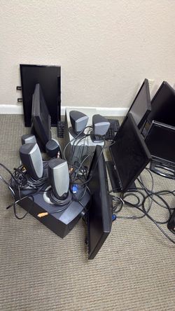 Lot of PC Monitors, Speakers, and Keyboards