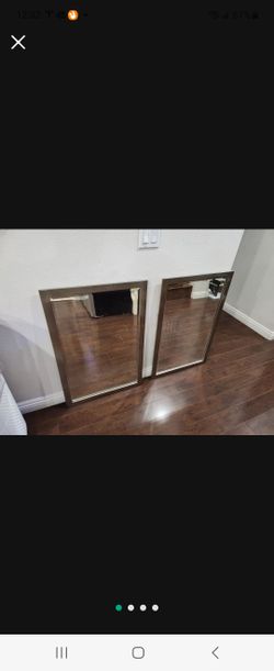 Two Metal Framed Mirrors
