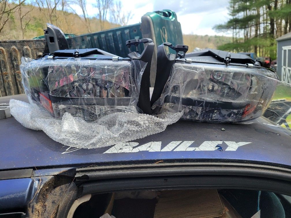 1(contact info removed) Dodge Dakota/ Durango new aftermarket headlights