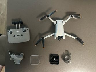 Dji Mini 3 (with remote, travel band, and ND filters)