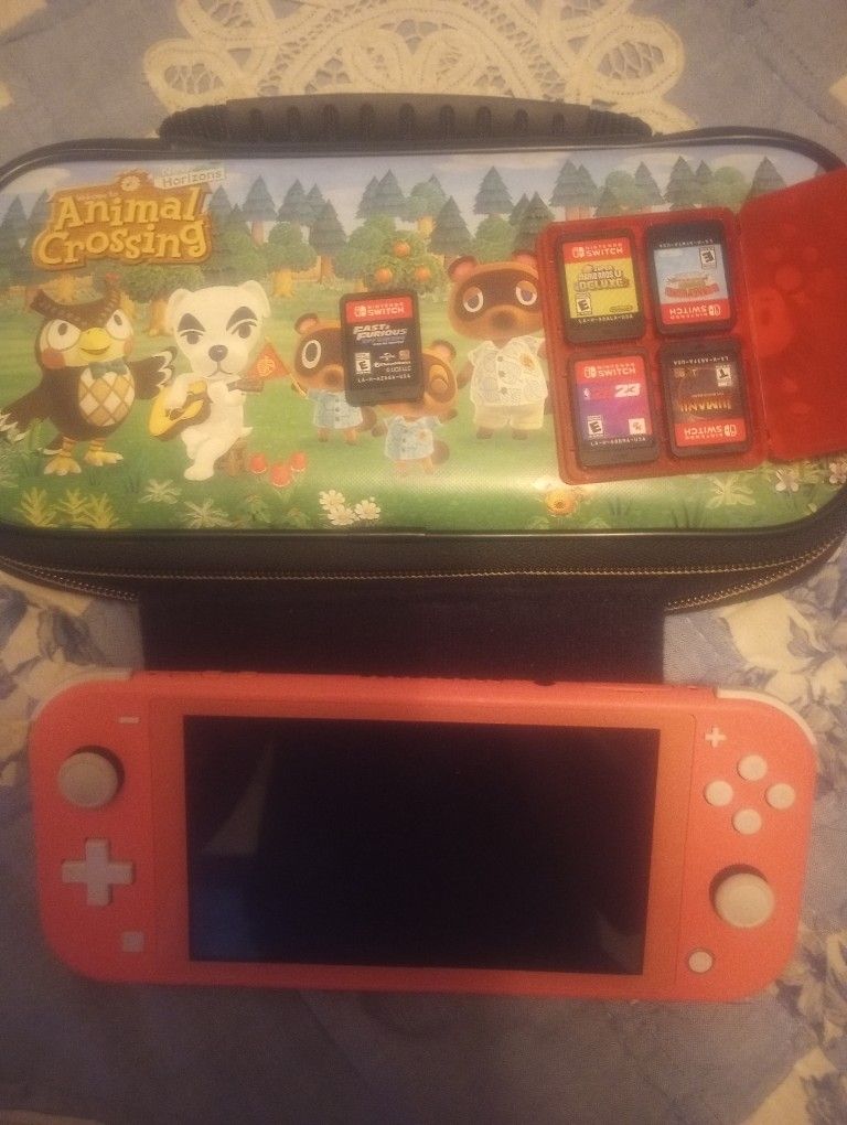 Pink Nintendo Switch Lite And Games 