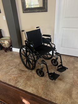 Lightweight Wheelchair With Footrests