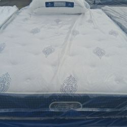 Brand new Queen size Beautyrest mattress and box spring.