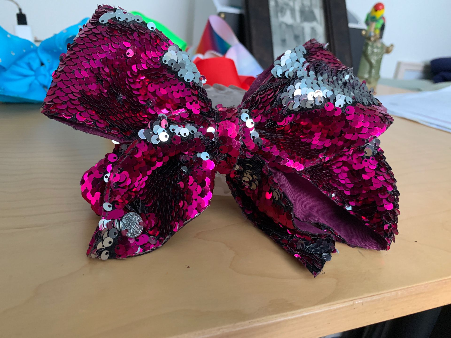 Jojo Siwa bow sequence magenta and silver