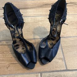is a pair of Sam Edelman Scarlett T-strap spiked high-heel embellished  shoes in blac k leather.  Size 8 Women's 