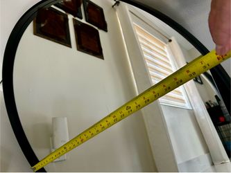 Modern circular mirror for sale.