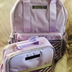 Lilac Stripe Backpack and lunch box. New with tags. Girls love them! Backpack 12" W x 5" L x 17" H. lunch box 10" W x 3.5" L x 8" H. Brundage and Ches