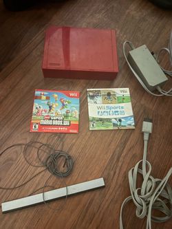 Wii + games + controllers