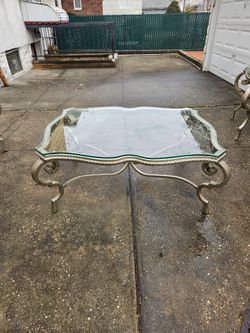 Expensive iron and glasstop coffee and 2 end tables