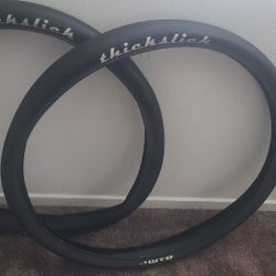 THICK SLICK TIRES IN EXCELLENT CONDITION 