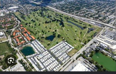 WATERFRONT CORNER LOT • GOLF COURSE COMMUNITY • $55,000 🌴