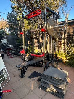 OLYMPIC SQUAT RACK SMITH MACHINE WITH OLYMPIC WEIGHTS AND BENCH
