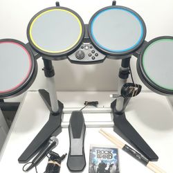 PS3 Rockband Wired Drumset/Microphone/Bass Pedal/Drumsticks/Rockband https://offerup.com/redirect/?o=VmlkZW9nYW1lLldvcmtz Great/Tested.