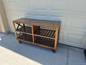 54" length Wooden tv entertainment trolley cart with slatted shelves, in very good condition