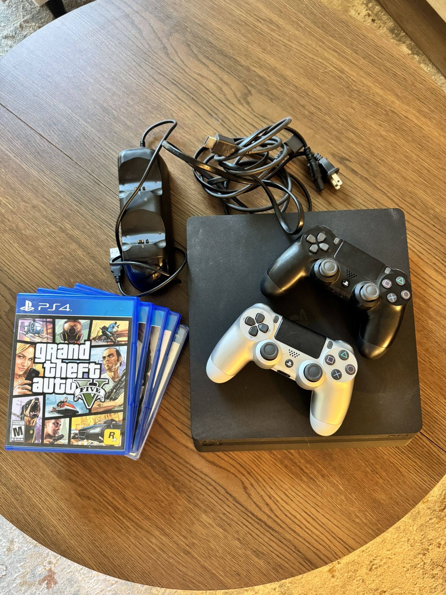 PS4 With 2 Controllers, Charging Station And 5 Games