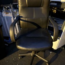 Small black vinyl office chair