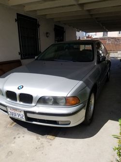 1997 BMW 540i four-door sedan grey on Grey interior clean titloe 92000 miles asking $3500