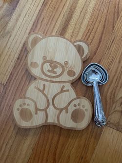 Cutting board and measuring spoons
