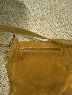 Guess shoulder saddle bag with fringe