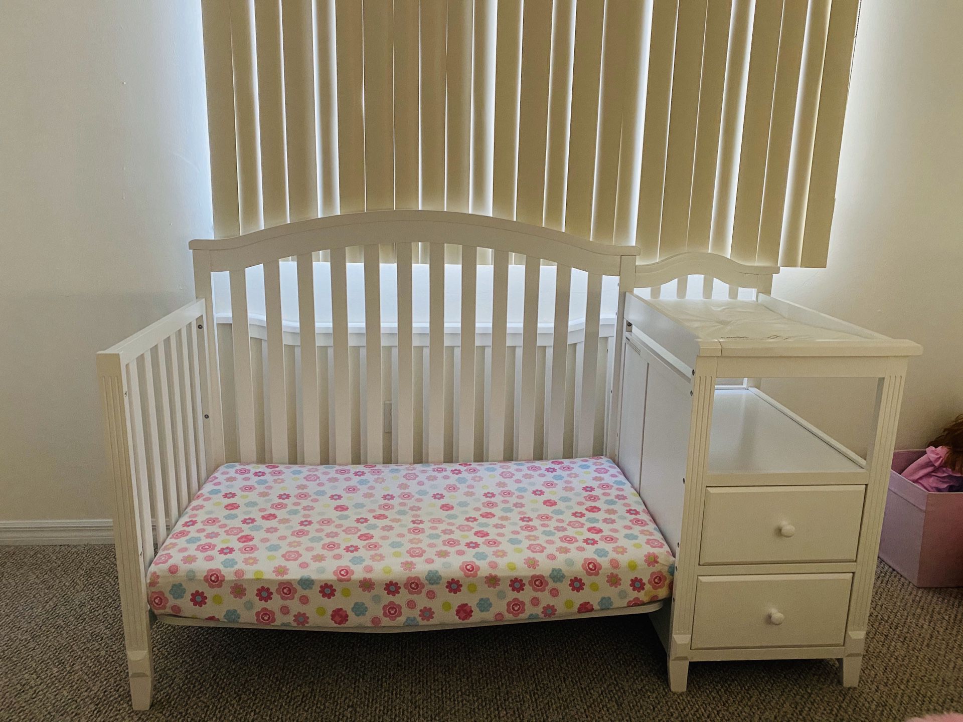 baby cot that becomes a bed with changing table and two drawers