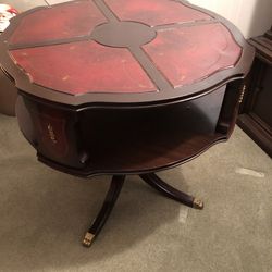 Antique foyer table with brass toes
