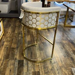 Light Gray Barstool With Gold Legs And honeycomb Design 