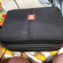 Nintendo switch with games/case/ 3 controller