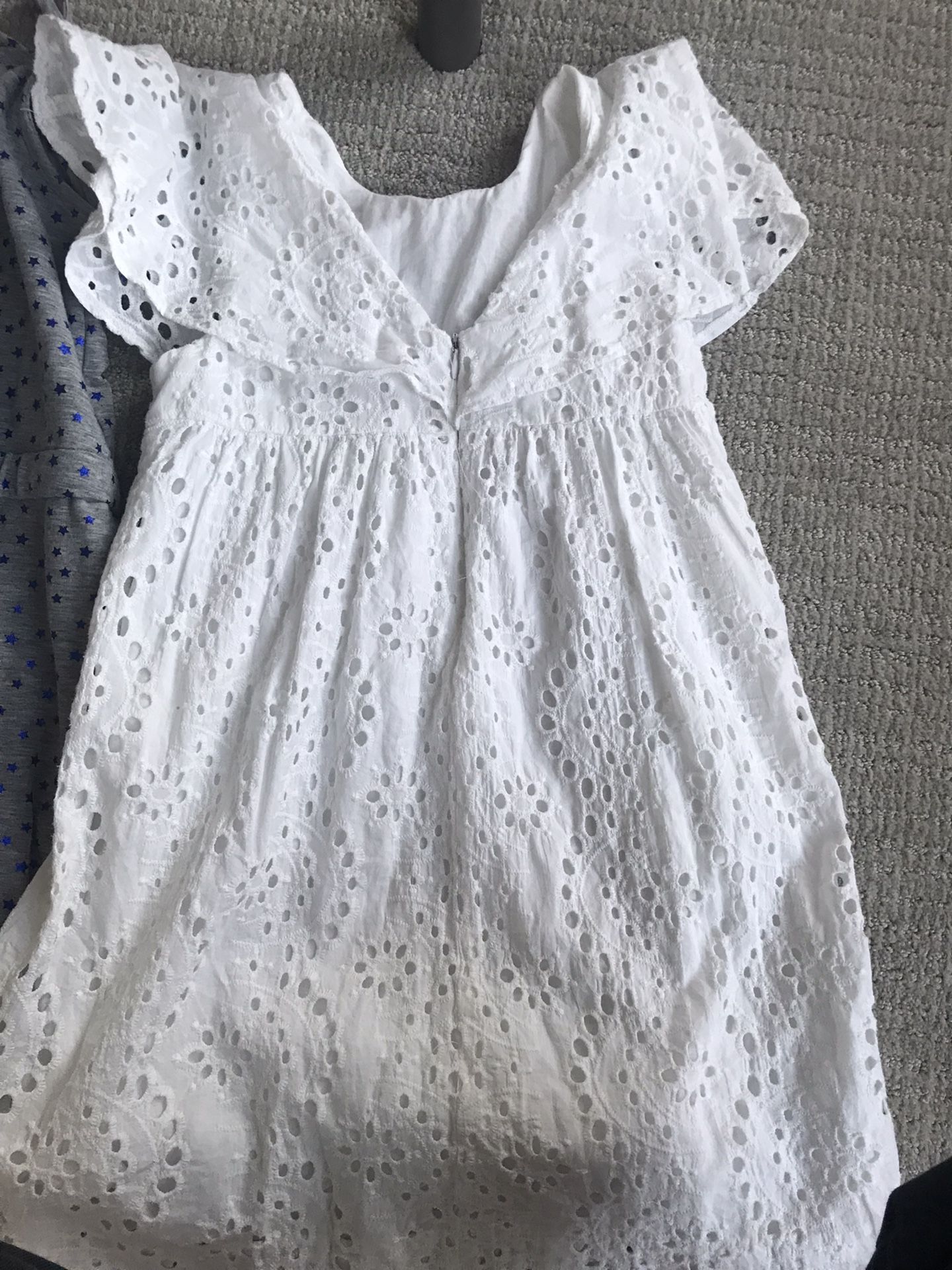 Three rompers and one dress