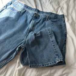 Two pairs of size 42 Wrangler jeans , in practically new condition no stains or noticeably wear