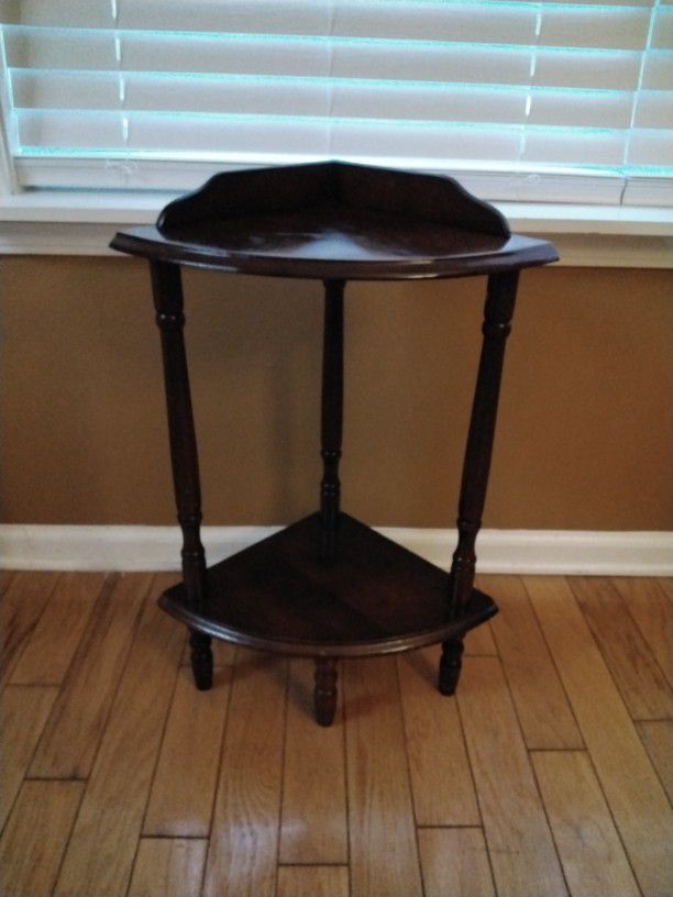 A Nice Corner Table Great For Small Lamp . It Has A Few Marks But Very Sturdy  .    See Size . 