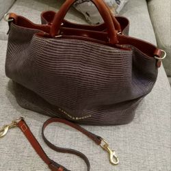 This is a Dooney & Bourke Embossed Lizard XLarge Barlow Bag. 