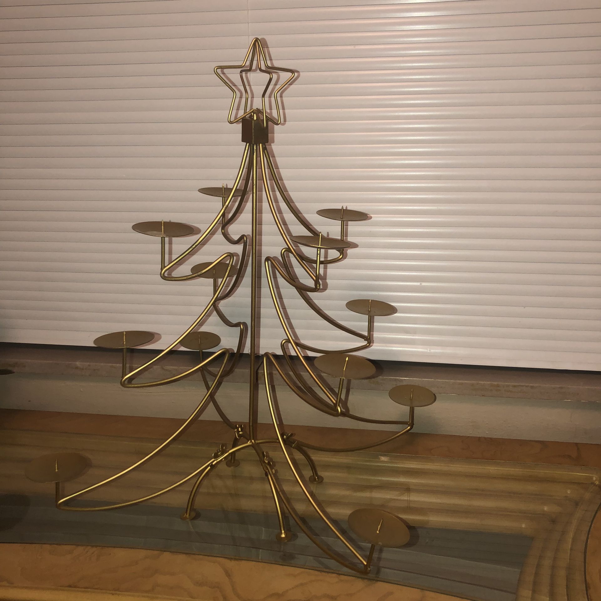 Golden metal Christmas tree candle holder decoration that comes apart for storage 20”x23”