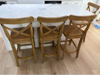 4 wooden bar stools $200