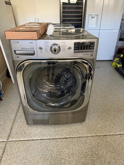 Front load LG washer and LG gas dryer set