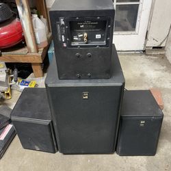 Miller and Kriesel subwoofer and front satelite speakers