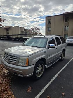 2004 escalade rwd clean title