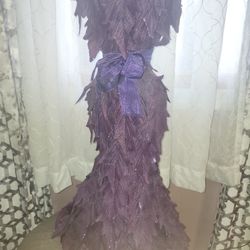 Decorative purple feather dress art piece. Custom made
