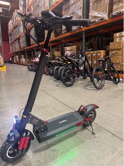 Front and rear shock-absorbing electric scooters