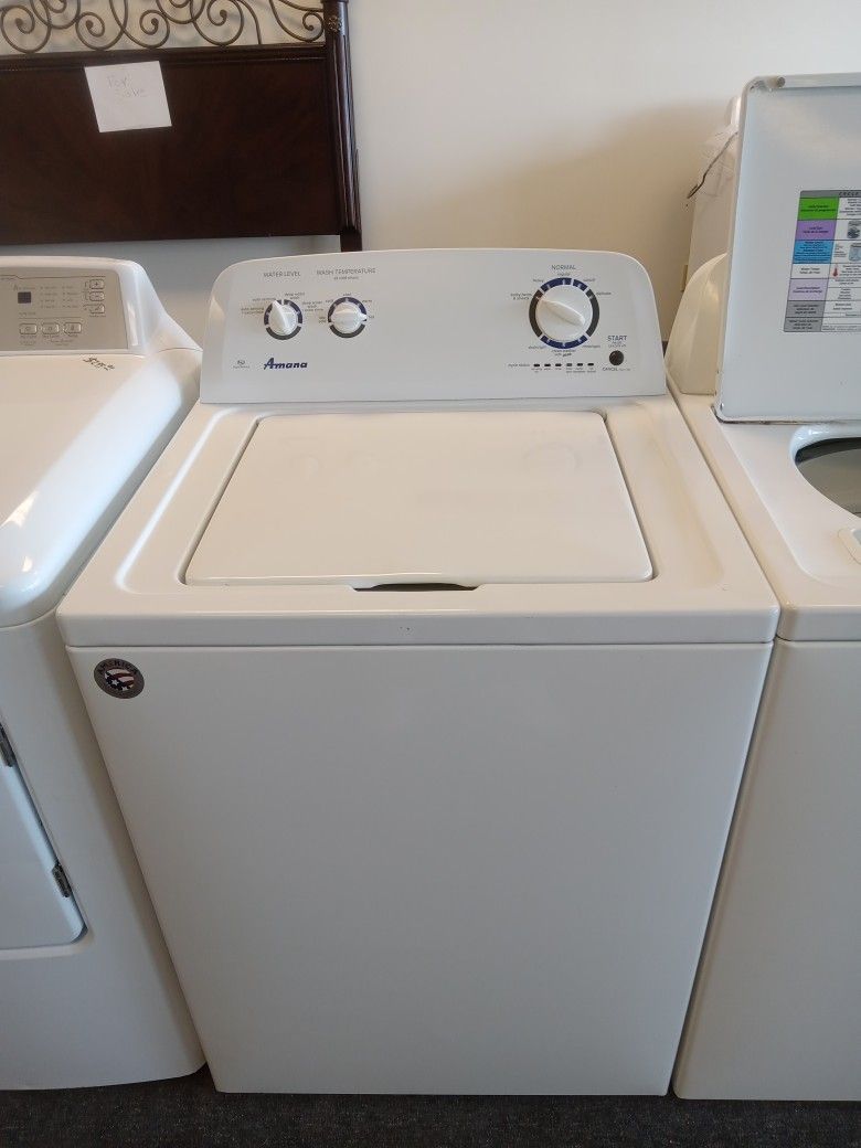 Washing machine in like new condition with warranty 