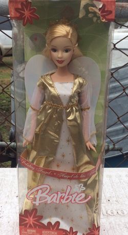 Barbie doll still in the box 📦