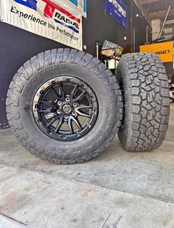 New Wheels & Tires Package Deal Fuel Rebel Wheels 305/70R17 Toyo Open Country ATIII Tires WE FINANCE