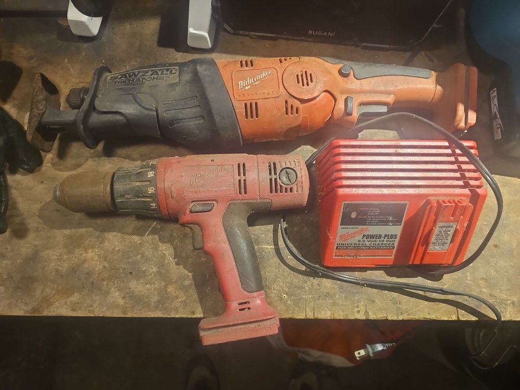Milwaukee Sawzall, Circular Saw, Light, And Hammer Drill With Charger