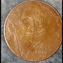 2010 D Copper Nickle Punched On A 1 Cent Planchet