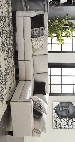 Brand New Sectional / couch & living room set. Ashley