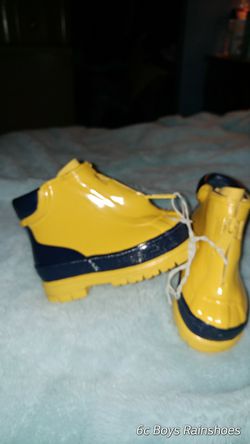 6c rain boots brand new