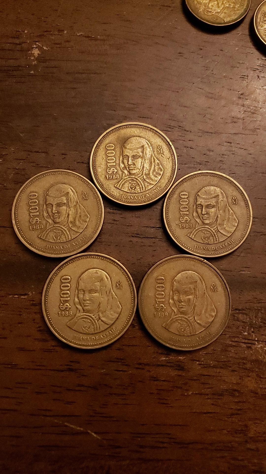 $5000 in demonetized Mexican Money. Collectors items. Five $1000 coins.