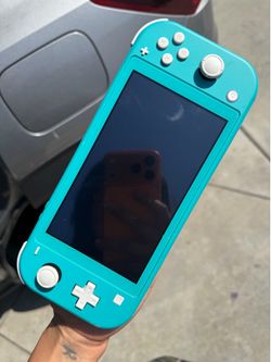 NINTENDO SWITCH LITE with Animal Crossings Game