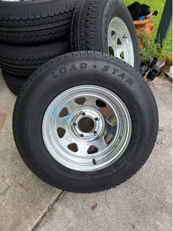 New 205-75-14inch trailer tires with 5-lug Galvanized rims. In stock