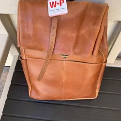 Whipping post leather roll top back pack